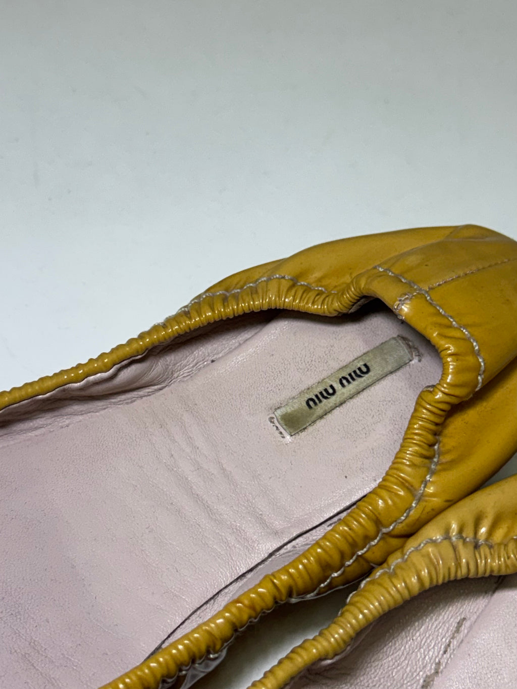 2000s Miu Miu mustard patent leather ballet flat