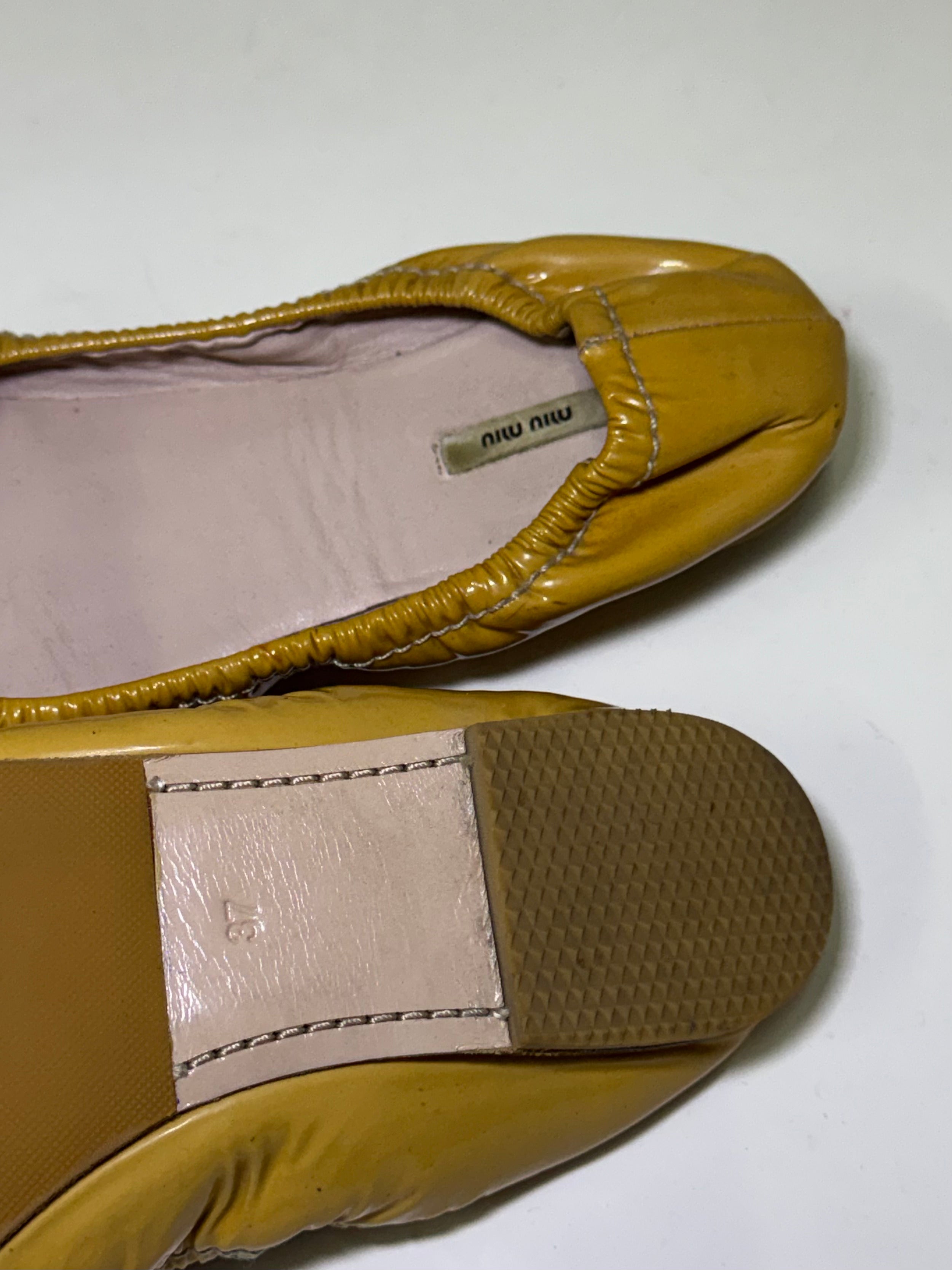 2000s Miu Miu mustard patent leather ballet flat